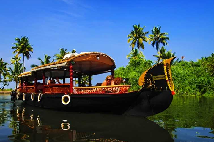 Day cruise on a Shikara boat in Alleppey backwaters.