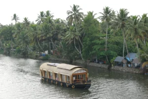 Luxury Alappuzha houseboat cruising through Kerala backwaters