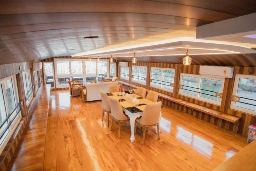 Luxury Kerala houseboat cruising through Alleppey backwaters for first-time visitors to India